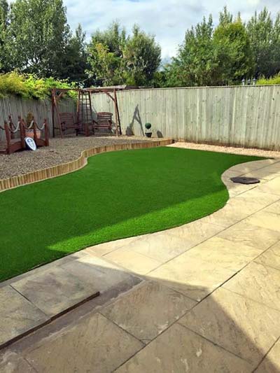 A garden we landscaped in Wakefield, showing the lawn and decorative paving we laid.