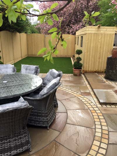 A garden we landscaped in Leeds, showing the fence and shed we erected, and the decorative paving we laid.